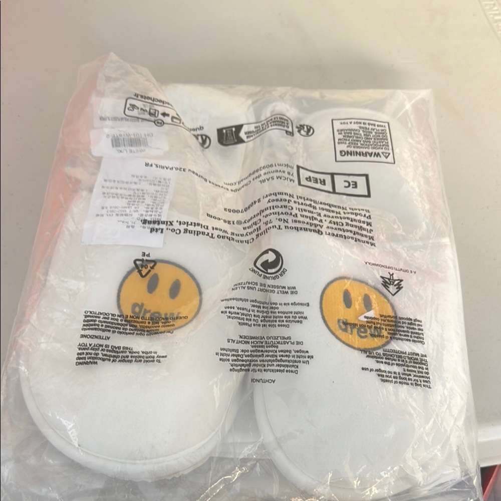 White Slippers with Yellow Smiley Face